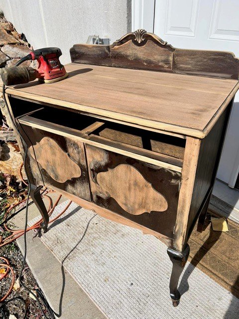 Sanding the cabinet