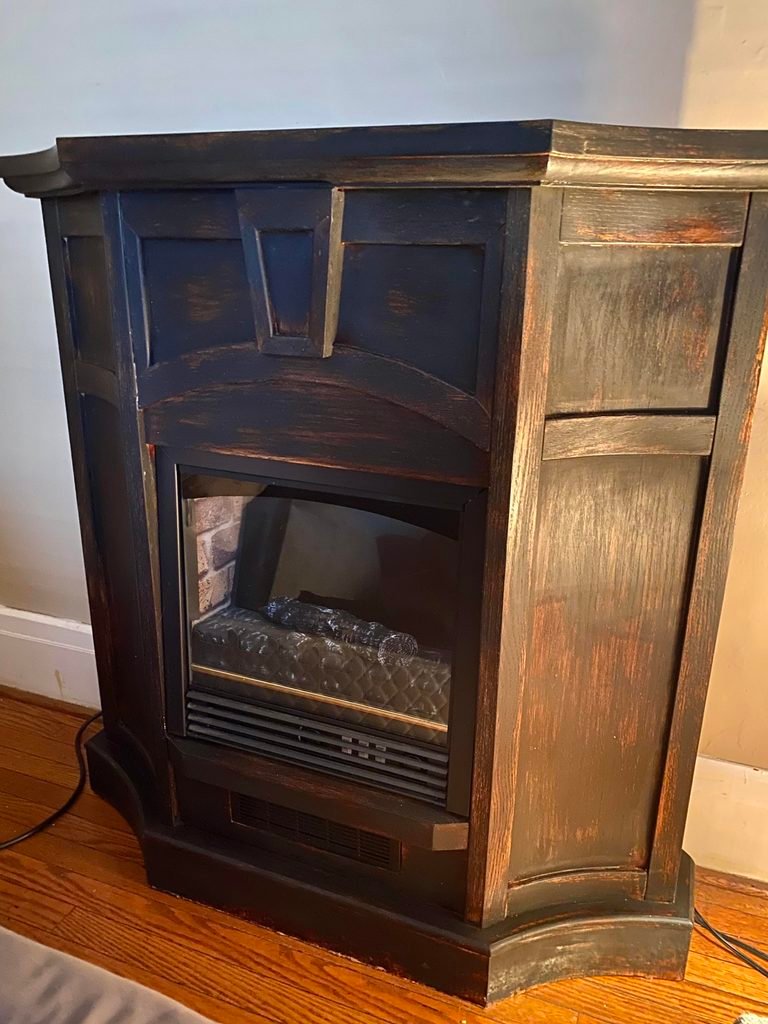 Black distressed fireplace