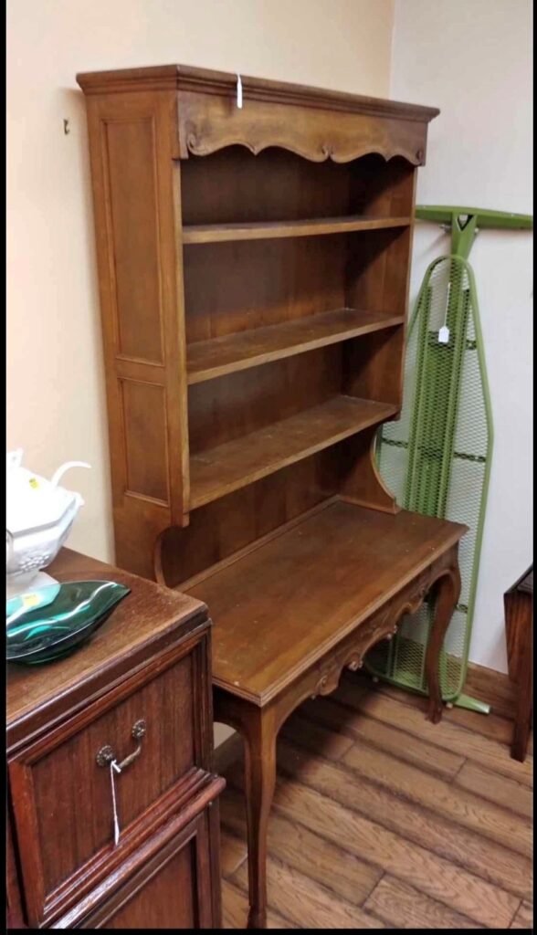 Vintage wood hutch in the antique dealer's shop as shown in original Facebook Marketplace listing.