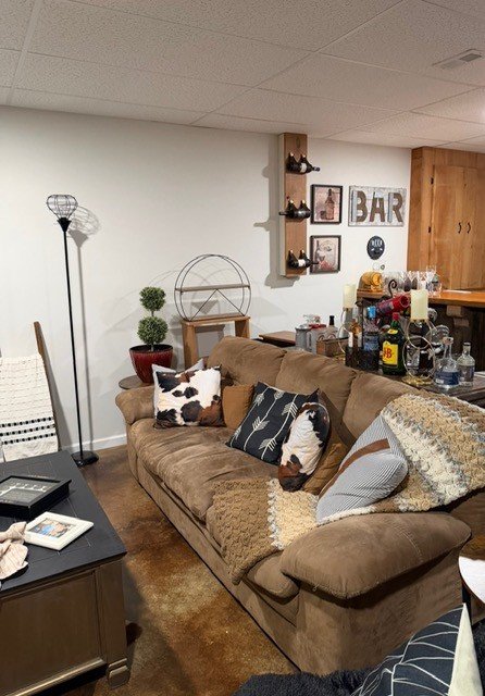 Industrial basement rec room before styling