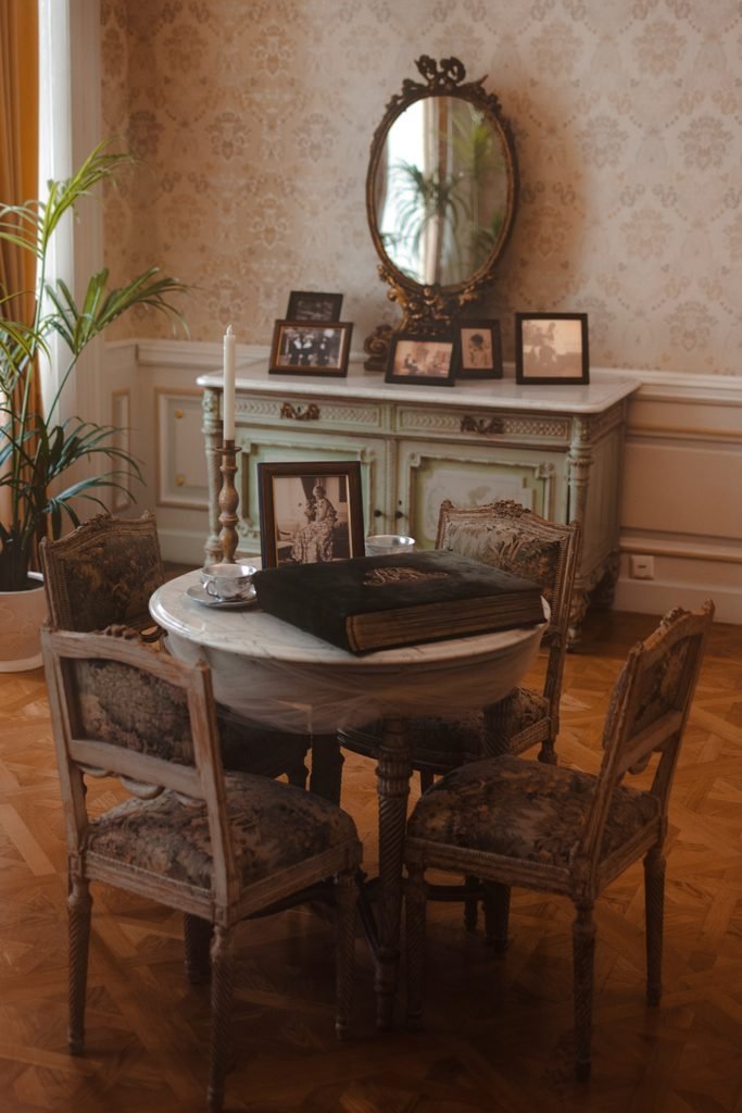 Elegant carved furniture in a French Provincial dining room