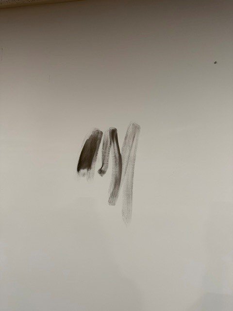 Mixing Tricorn Black with metallic Blackened Bronze paint - the wall test