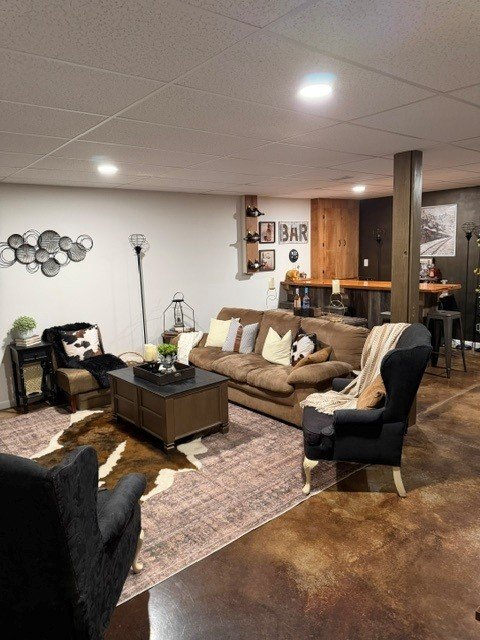 Basement Rec Room Refresh - a vintage-inspired rug that really softened the space