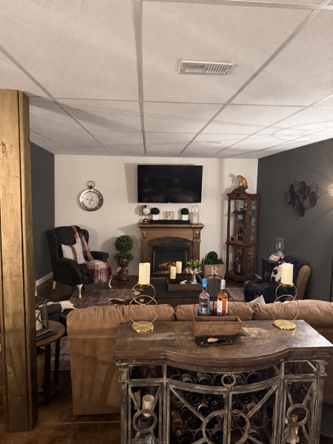 Mock-up showing walls in Iron Ore by Sherwin Williams next the the white TV wall