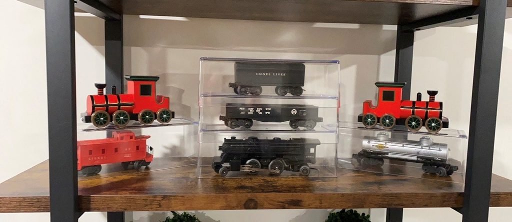 Vintage Lionel train pieces used in basement decor